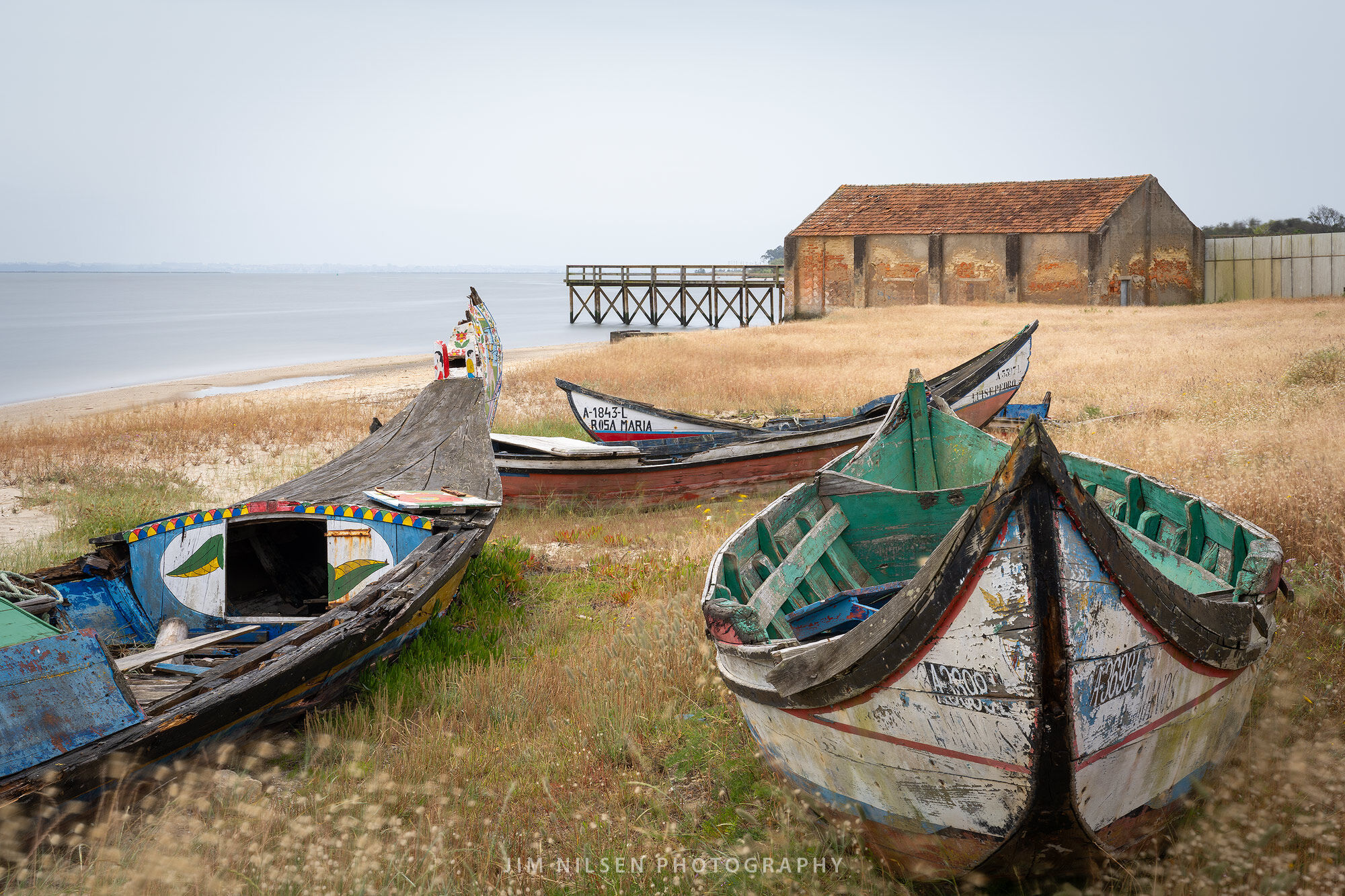 Saveiro Graveyard II The Saveiro are traditional Portuguese fishing boats.